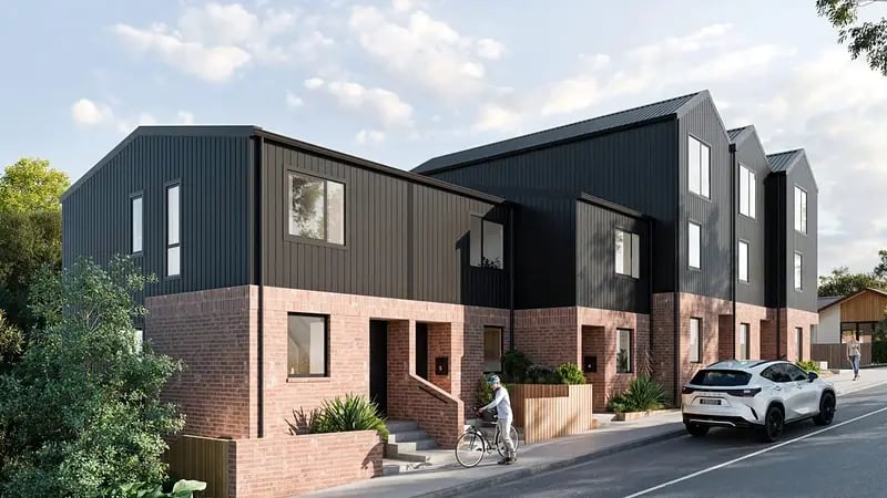 Render of the street frontage of 118 Wadestown Road, Wellington, showing brick-based townhouses with entry steps and aluminium windows
