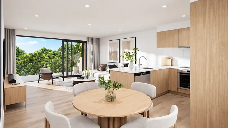 Render of an open-plan living, dining and kitchen area at 24 Haumia Street with black-framed stacking doors opening to a balcony