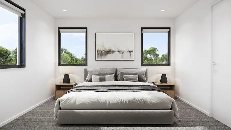 Render of a bedroom at 24 Haumia Street with three black-framed aluminium windows