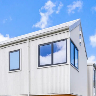 Aluminium awning windows installed in a contemporary multi-residential development, delivering efficient ventilation and a clean architectural finish