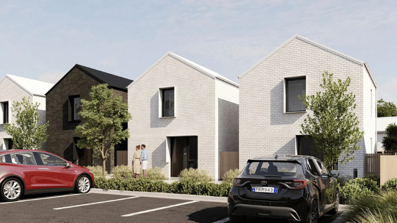 Architectural render of two-storey homes at Campbell Village featuring aluminium windows and landscaped parking areas.