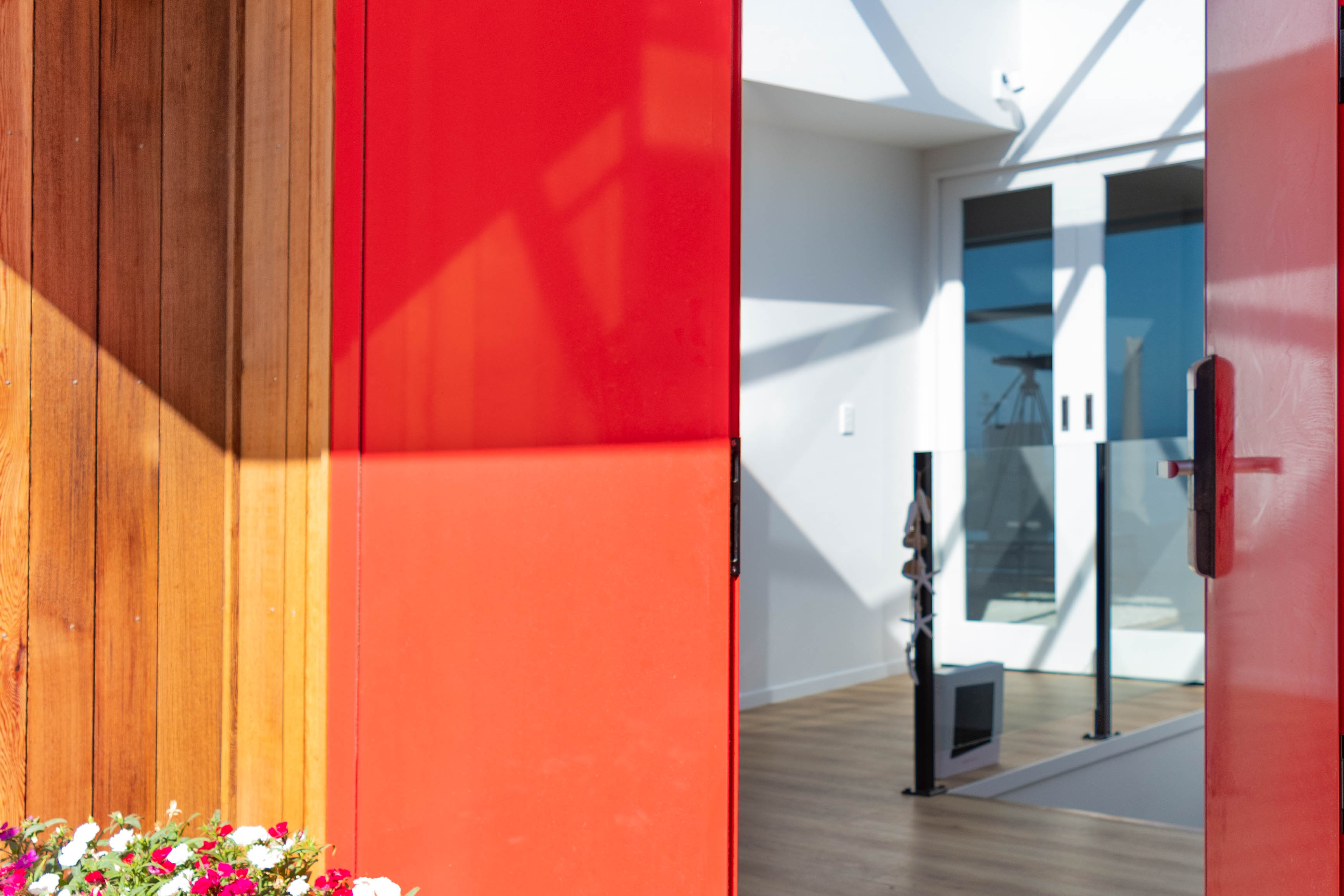 Red entrance door with a Yale digital lock 