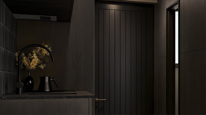 Interior architectural render of Maribel Apartments showing a dark hinged door and aluminium window.