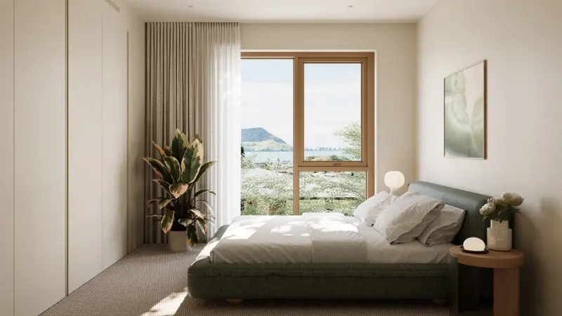Bedroom at 30 Milton Road featuring a large aluminium window with views towards Tauranga.