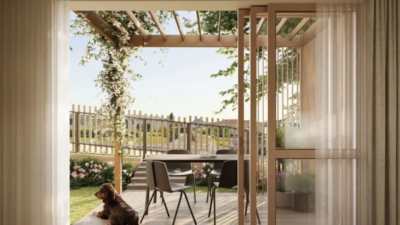 Outdoor living area at 30 Milton Road viewed through a large glazed aluminium door.