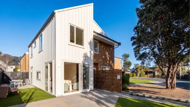 Front corner view of the 15–17 Puriri Street multi residential development featuring UNO Thermal aluminium windows and sliding doors in Matt Titania.